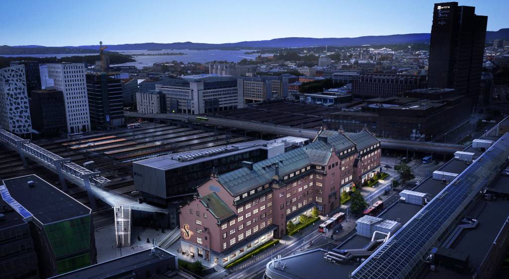 Tollgaarden har vært en del av Oslos bybilde de siste 100 årene. Entra er i full sving med å bygge moderne og fleksible arbeidsfellesskap i denne historiske bygningen, og i 2024 flytter Amedia inn. Illustrasjon: 3D Estate